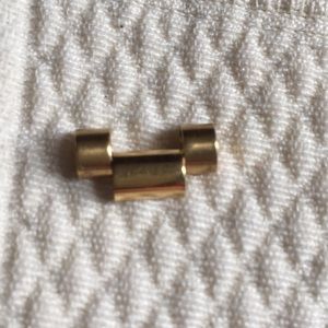 18k gold Rolex link from 1965 men’s watch